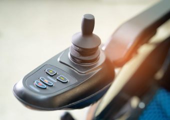 A close-up photo of a mobility scooter controls.