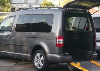 An image of a wheelchair accessible vehicle with access from the back.